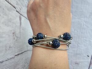 Silver Color Stretch Wire Magnetic Bracelet With Blue and Silver Colored Beads